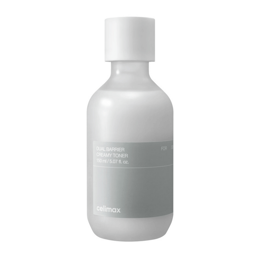 Vit flaska med grå etikett för Celimax Dual Barrier Creamy Toner – en återfuktande toner med mild formula, särskilt utformad för känslig och torr hud.