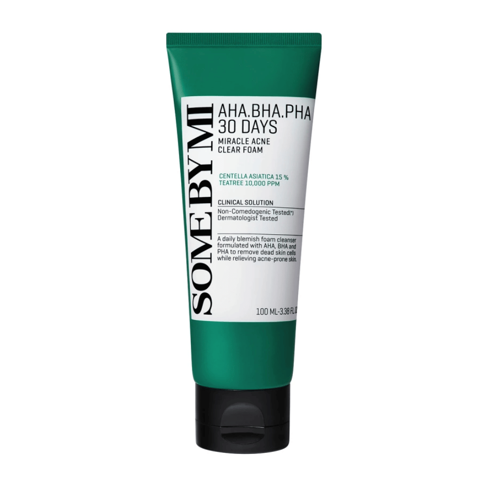 A tube of "SOME BY MI AHA, BHA, PHA 30 Days Miracle Acne Clear Foam". The product contains centella asiatica and tea tree oil, designed to treat acne and cleanse the skin. The tube is 100 ml and is dermatologically tested to ensure safety and effectiveness.