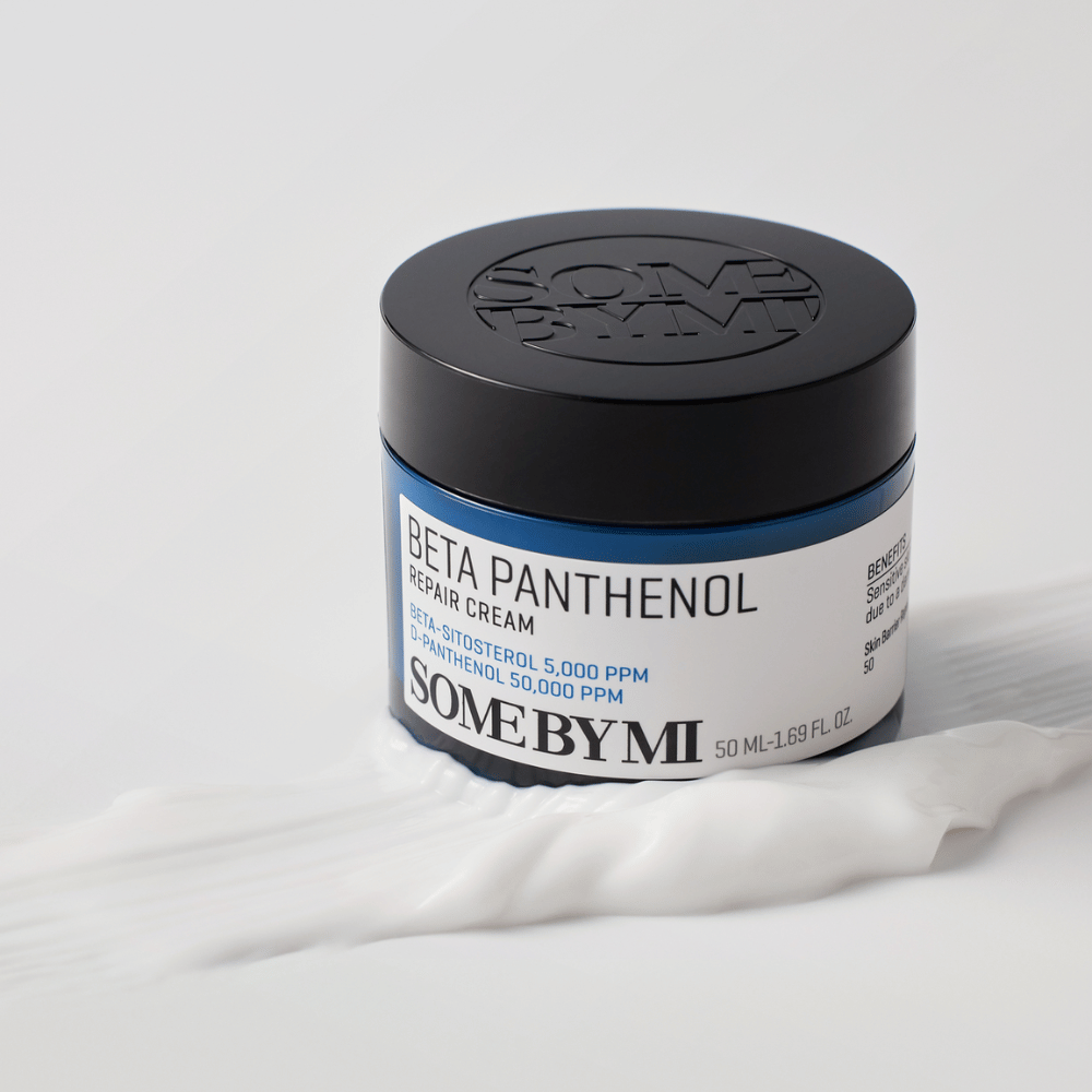 SOME BY MI Beta Panthenol Repair Cream in blue jar placed on cream texture – soothing and hydrating skin cream.