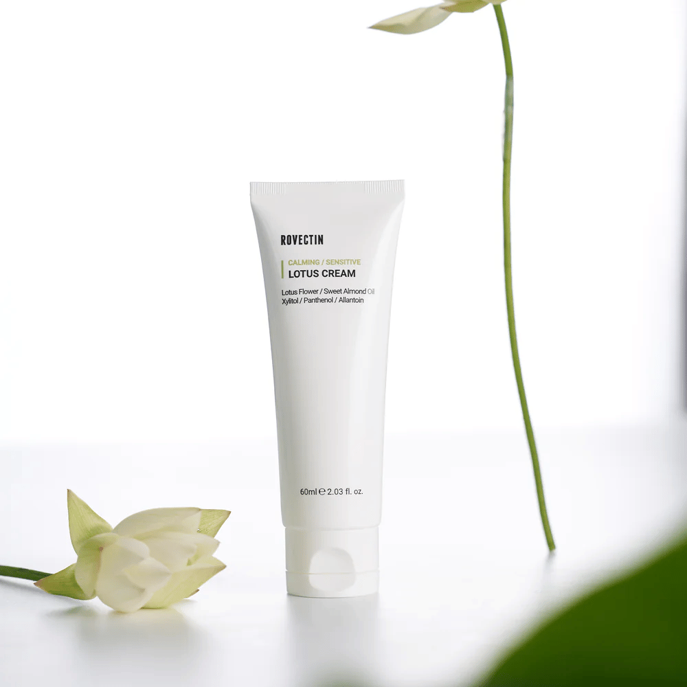 Tube with Rovectin Lotus Cream for soothing and sensitive skincare, presented with a lotus flower.