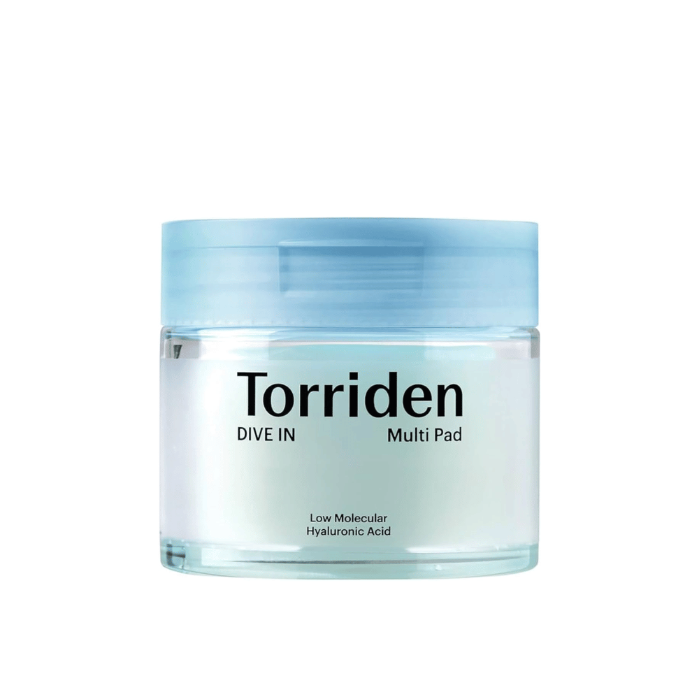 Transparent jar with Torriden "DIVE IN Multi Pad", hyaluronic acid, against a white background.