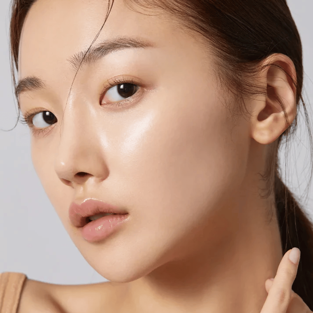 Close-up of model with clear, hydrated skin and natural radiance after using Korean Sheet mask.