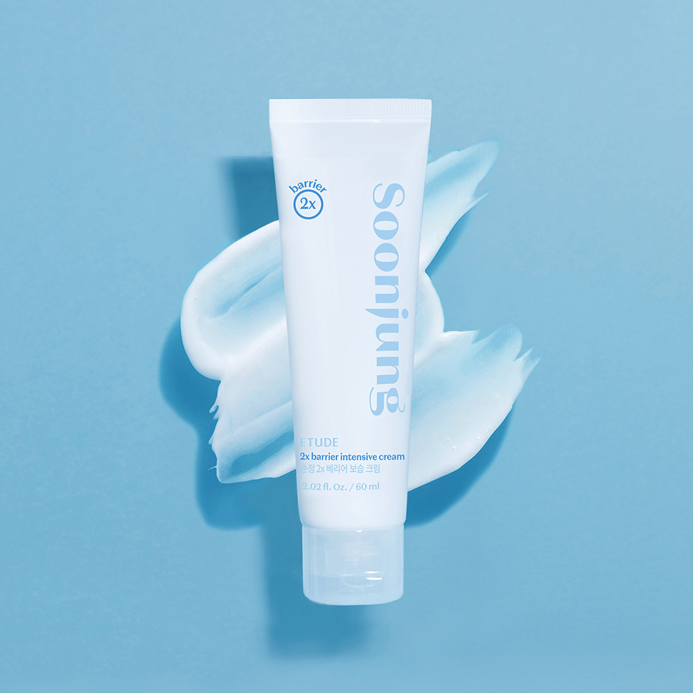 A tube of white cream that repairs skin damage and moisturizes the skin, specifically ETUDE Soon Jung 2x Barrier Intensive Cream 60ml, on a blue background.