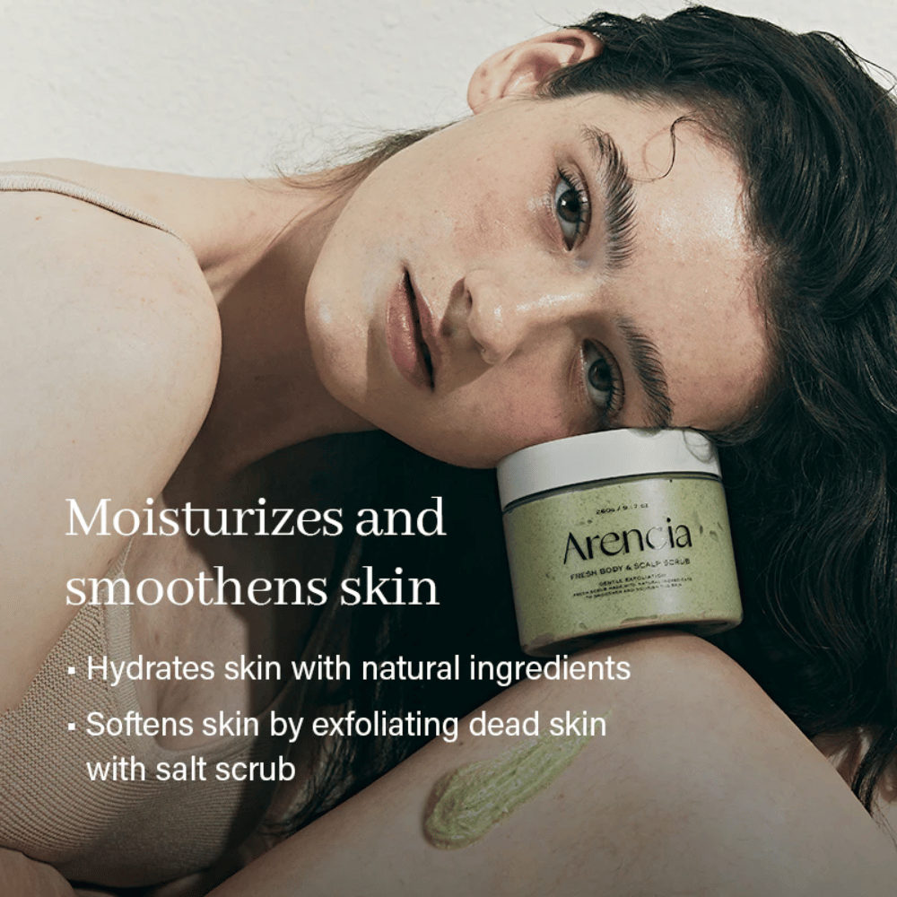 Model rests with Arencia Fresh Cloud Body & Scalp Scrub. Moisturizing body scrub that softens the skin and provides a more even skin result.