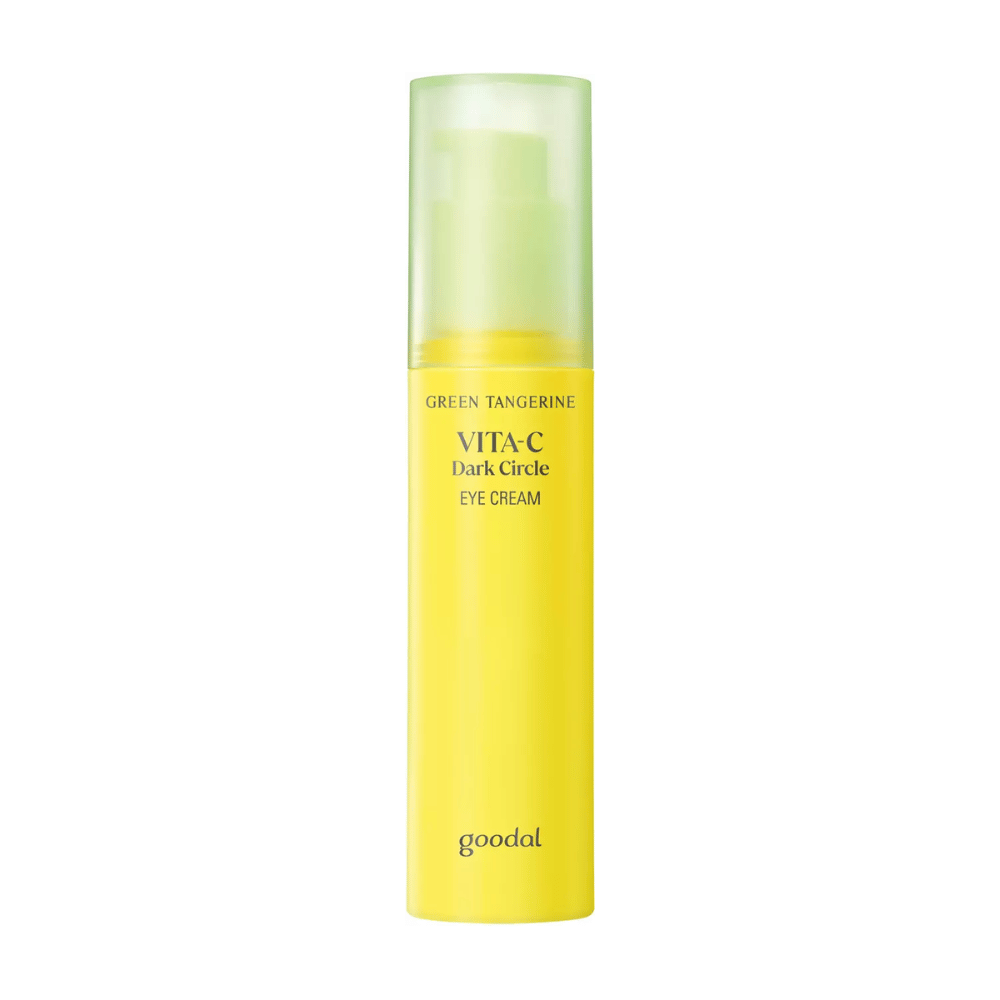 A bottle of Goodal Green Tangerine Vita C Dark Circle Eye Cream 30ml on a white background with vitamin C.