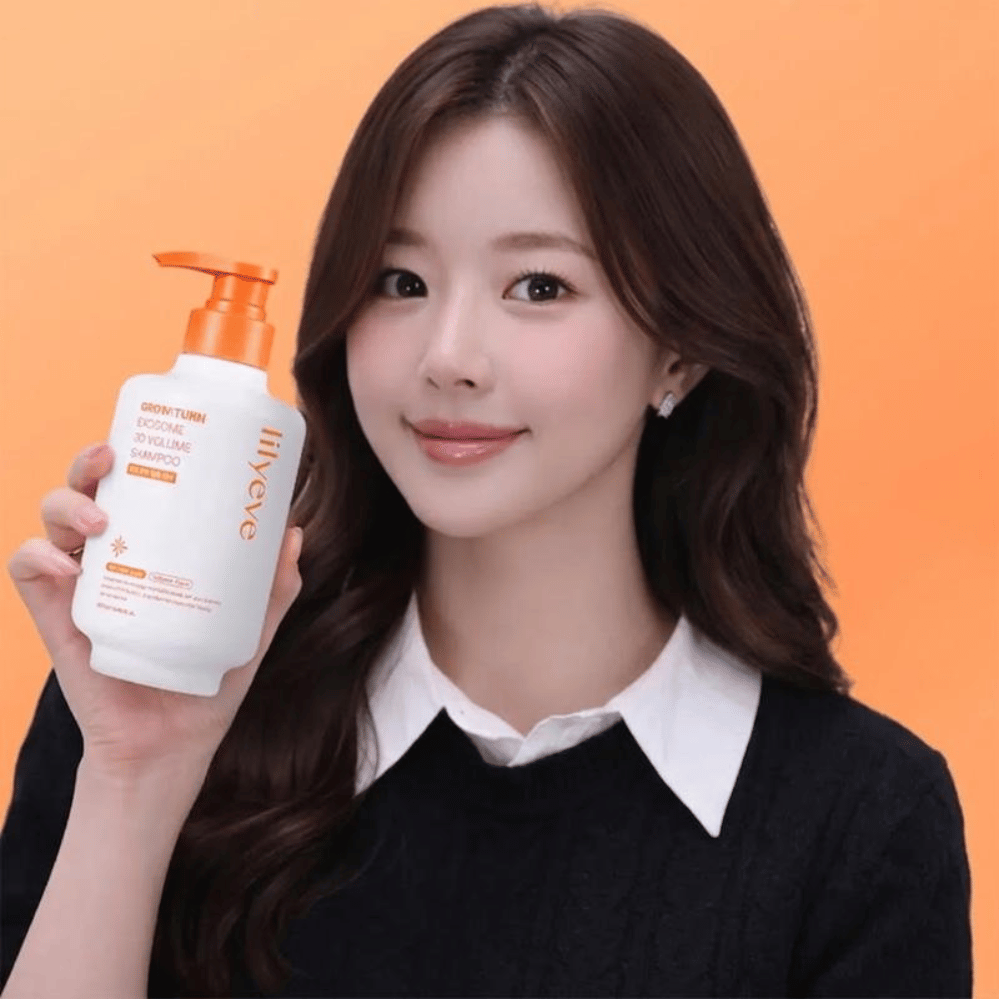 A person is holding LILYEVE Grow:Turn Exosome 3D Volume Shampoo for volumizing hair and scalp care