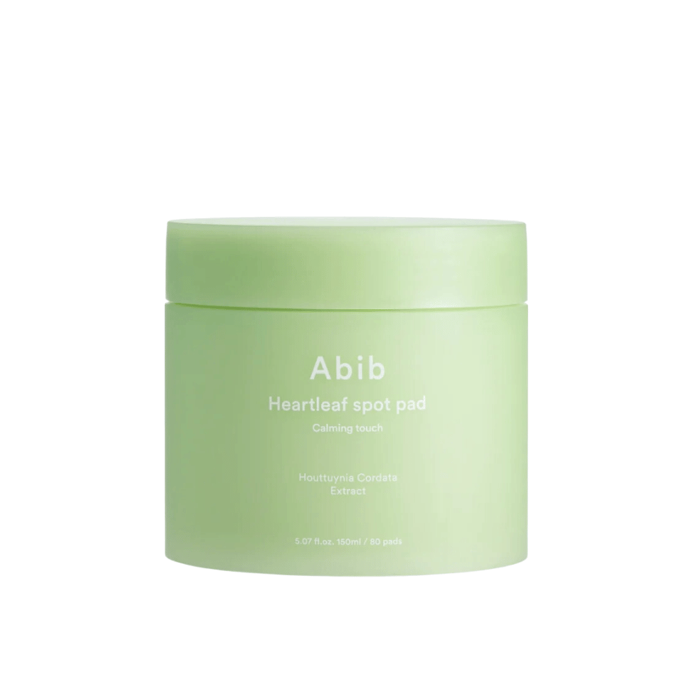 Jar with Abib Heartleaf Spot Pad Calming Touch, soothing skincare pads with Houttuynia Cordata extract.