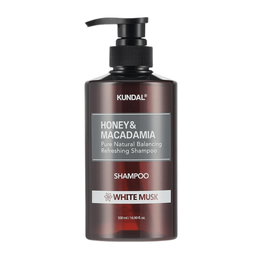 KUNDAL Honey & Macadamia Nature Shampoo White Musk in brown plastic bottle with pump, 500 ml.