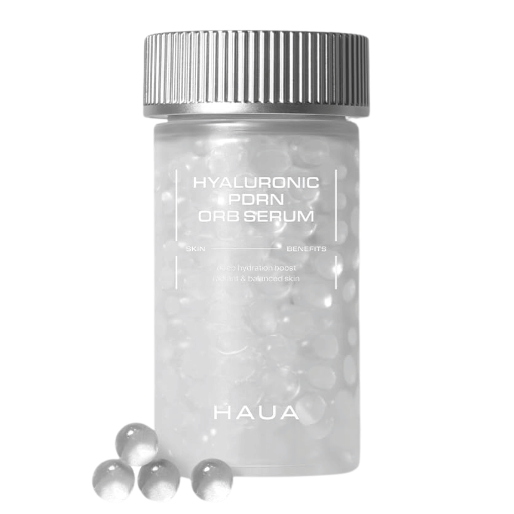 Product image of HAUA Hyaluronic PDRN Orb Serum on a white background. The transparent container is filled with serum capsules and highlights the product's unique encapsulated formulation.