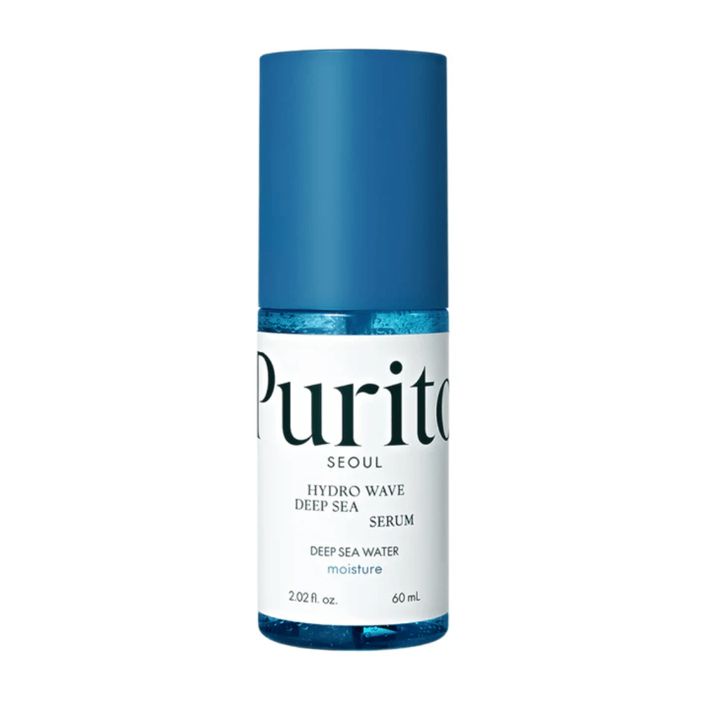 A product image of Purito Hydro Wave Deep Sea Serum. The bottle is transparent with a blue cap and contains a deep blue serum. The text on the label indicates that the product is 60 ml and offers moisturizing properties with deep sea water. The design is clean and modern.