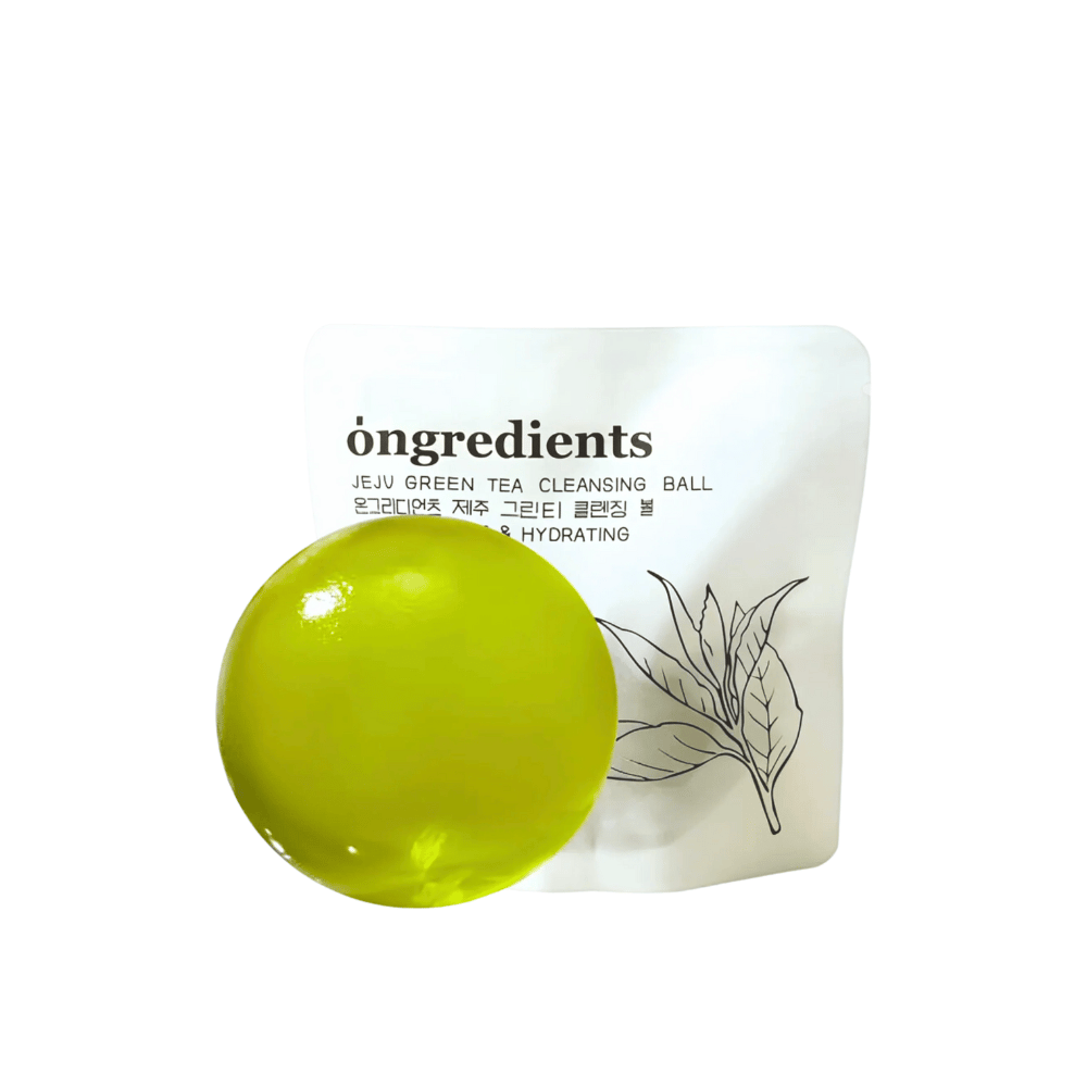 Product image of Óngredients Jeju Green Tea Cleansing Ball in front of packaging – vegan cleanser that refreshes and hydrates the skin.