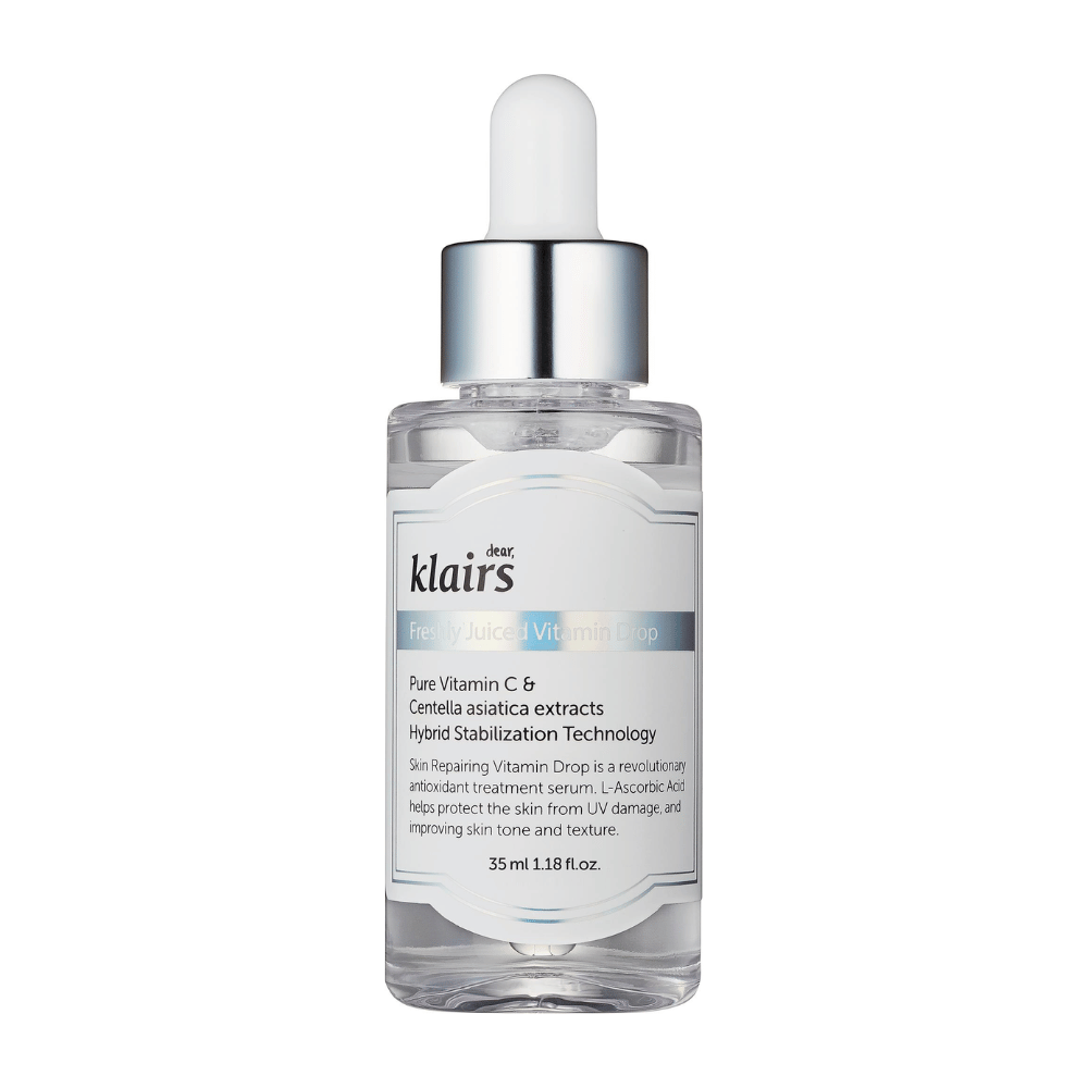 A glass bottle with a dropper cap from Klairs, Freshly Juiced Vitamin Drop, with text about vitamin C and Centella asiatica extract, on a white background.