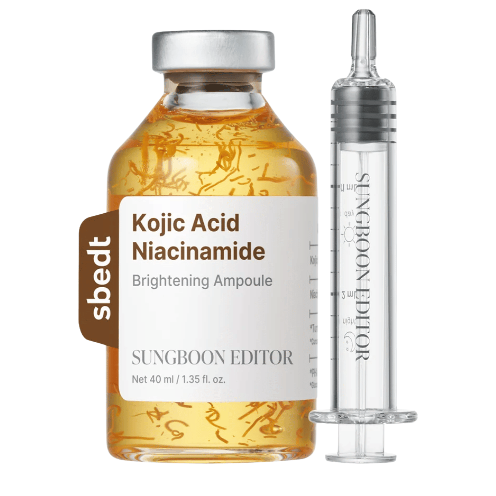 7. SUNGBOON EDITOR Kojic Acid Niacinamide Brightening Ampoule 40 ml – golden serum bottle with visible active threads and transparent applicator against a white background