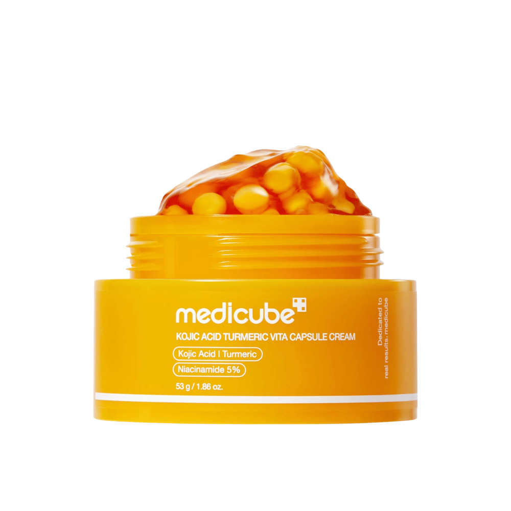 5. Medicube Kojic Acid Turmeric Vita Capsule Cream 53 g – yellow jar with gel cream and capsules on a white background