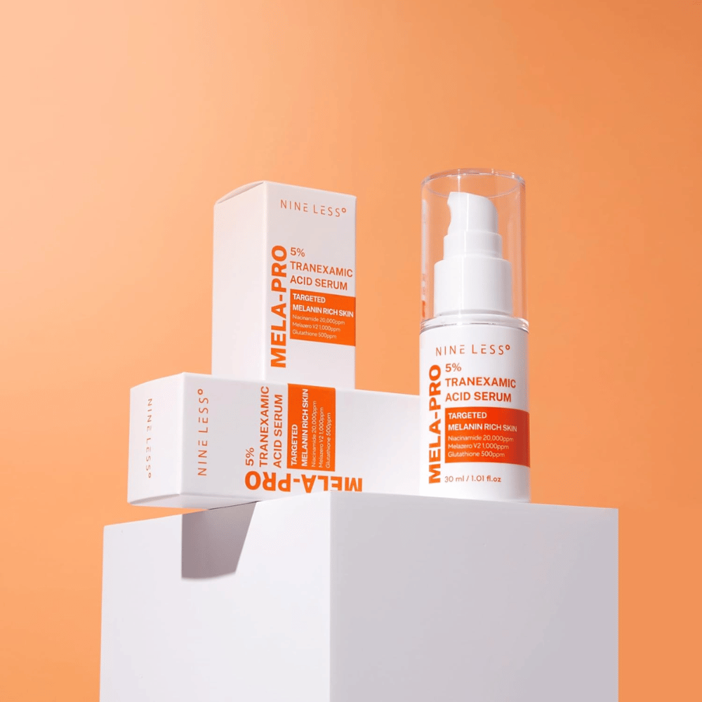 NINE LESS MELA-PRO 5% Tranexamic Acid Serum 30 ml with packaging, radiance-giving serum against pigmentation spots and uneven skin tone.