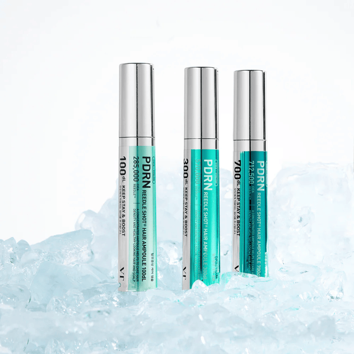 Several variants of PDRN Reedle Shot Hair Ampoule placed on ice, symbolizing refreshing effect and intensive care for a balanced and healthy scalp.
