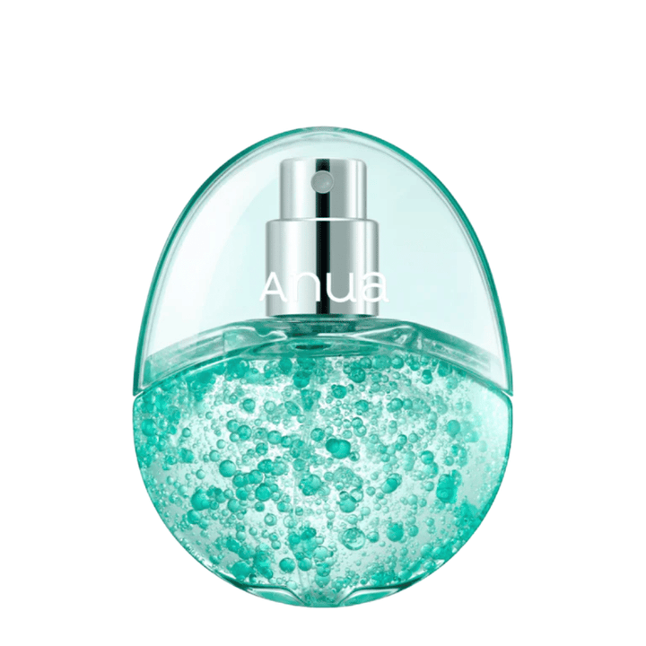 Cut-out product image of Anua PDRN Hyaluronic Acid Hydrating Capsule Mist against a light background. The egg-shaped bottle has a transparent upper part and a lower part filled with turquoise moisturizing capsules that highlight the product's unique formulation and premium feel.