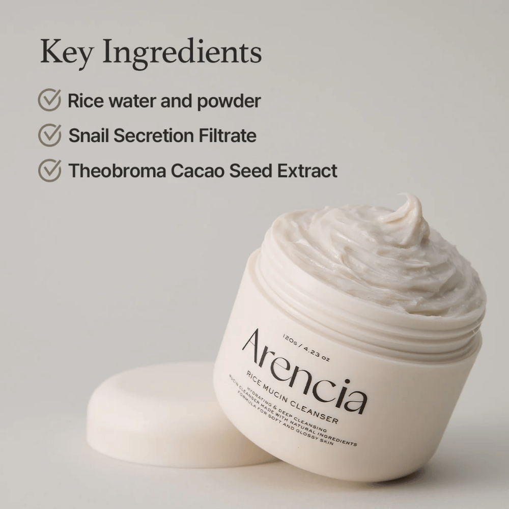 Jar with Arencia Rice Mucin Cleanser, open and filled with a creamy, white cleanser. The text lists key ingredients: rice water and powder, snail secretion filtrate, and cocoa seed extract.