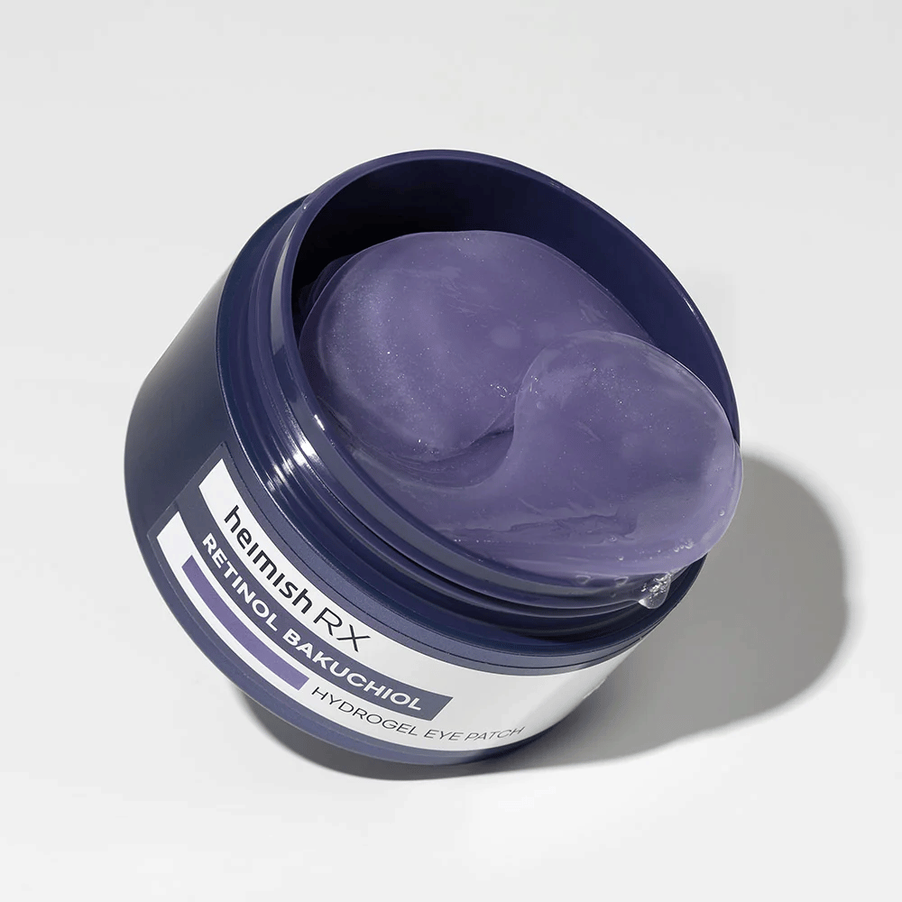 Heimish RX Retinol Bakuchiol Hydrogel Eye Patch in a dark blue jar with purple hydrogel eye patches. A product designed to moisturize and reduce fine lines around the eyes.