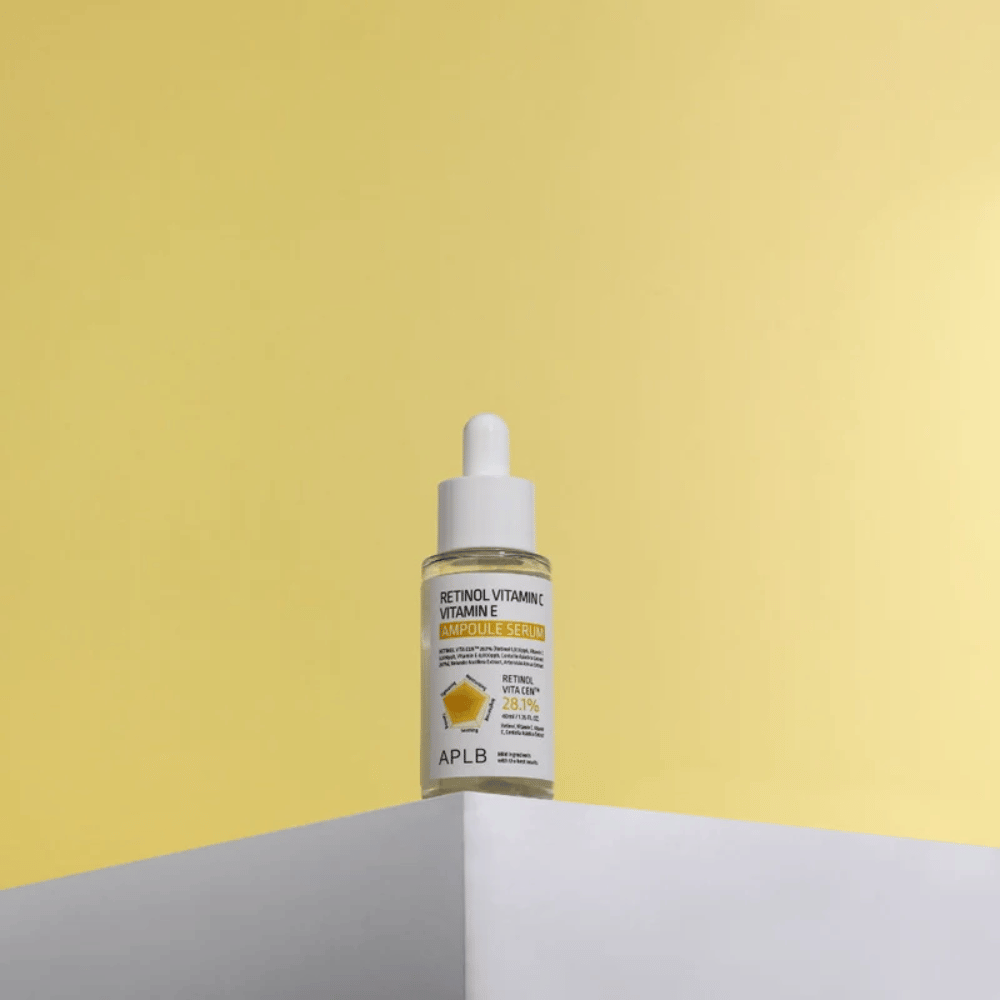 APLB Retinol Vitamin C Vitamin E Ampoule Serum 40 ml on a white pedestal