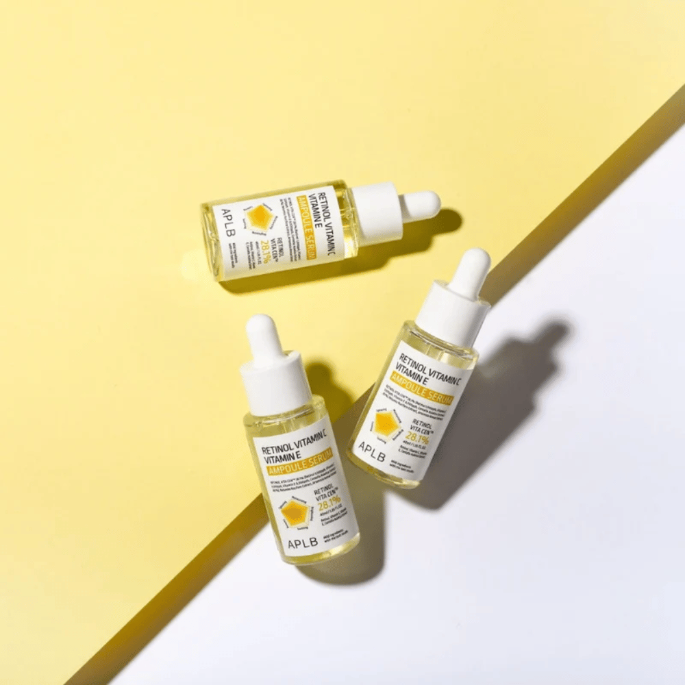 APLB Retinol Vitamin C Vitamin E Ampoule Serum on a yellow and white background