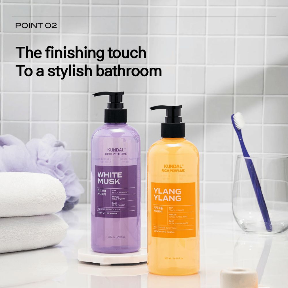 3. KUNDAL Rich Perfume Body Wash White Musk & Ylang Ylang – two shower gels in a stylish bathroom setting