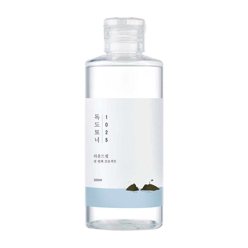 An open bottle Round Lab 1025 Dokdo Toner with a simple design and sea theme, on a white background.