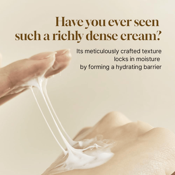 Rich and dense consistency of Salmon Caring Centella Cream showing how the cream forms a moisturizing barrier and locks in moisture in the skin.