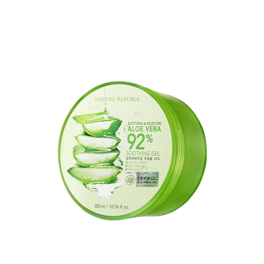 A green round jar with Nature Republic Aloe Vera 92% Soothing Gel. The packaging shows an image of aloe vera leaves and text describing the product's soothing and moisturizing properties. The content is 300 ml (10.56 fl. oz).