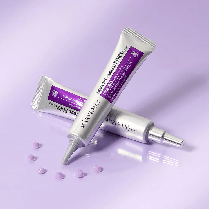 Mary & May Spicule Collagen PDRN Cream in multiple tubes on a purple background, intensely restorative face cream with spicule technology and collagen.