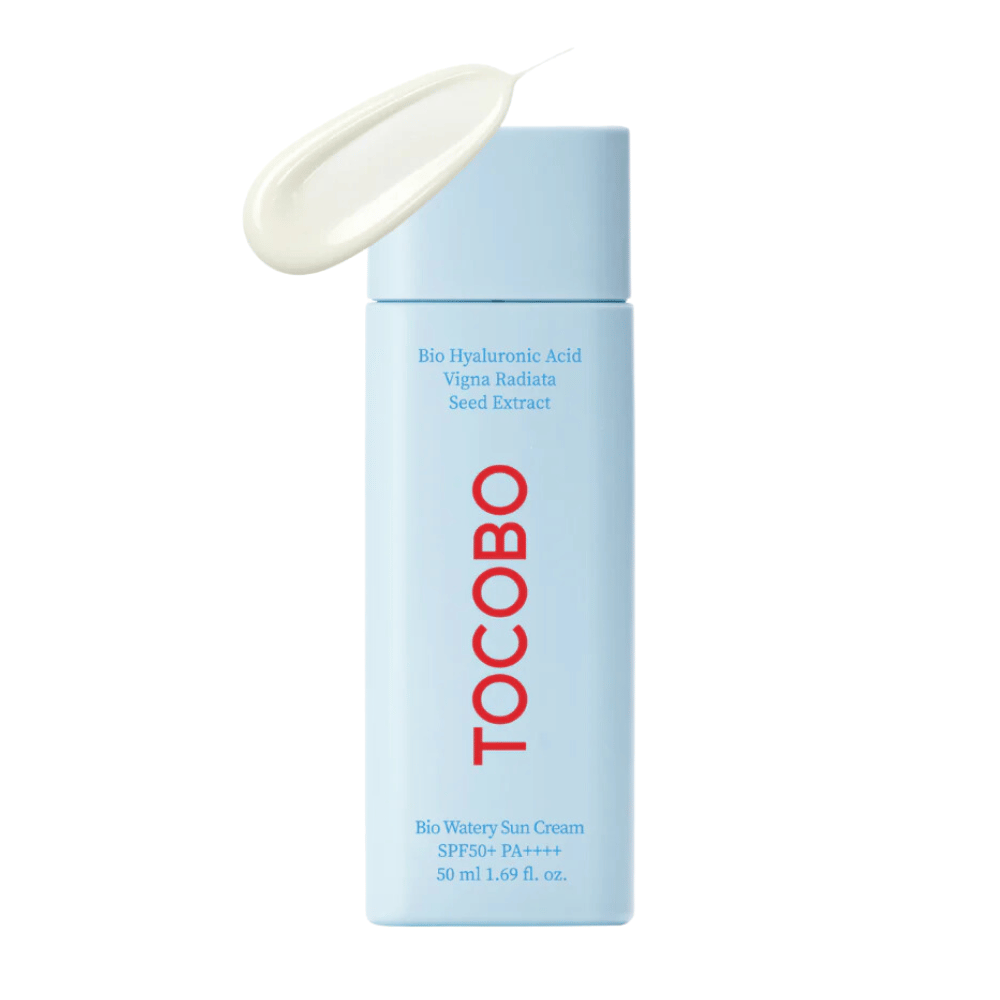 A bottle TOCOBO Bio Watery Sun Cream SPF50+ PA++++ 50ml with a cream containing natural ingredients for skincare.