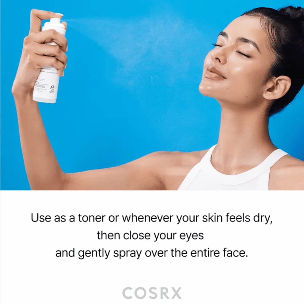 Woman spraying COSRX Ceramide Skin Barrier Mist on the face for quick hydration and a fresh feeling.