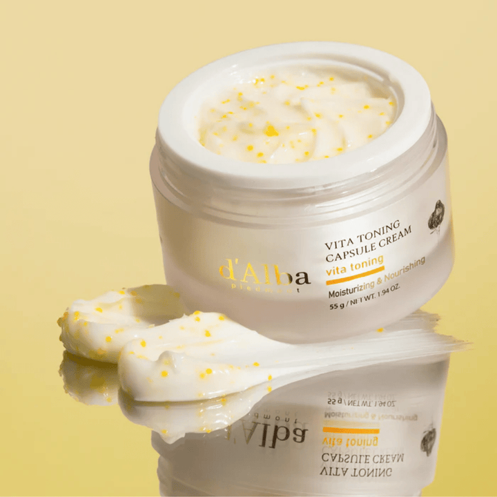 d'Alba Vita Toning Capsule Cream texture – face cream with white capsules that melt into the skin and help to moisturize and provide a clearer skin tone.