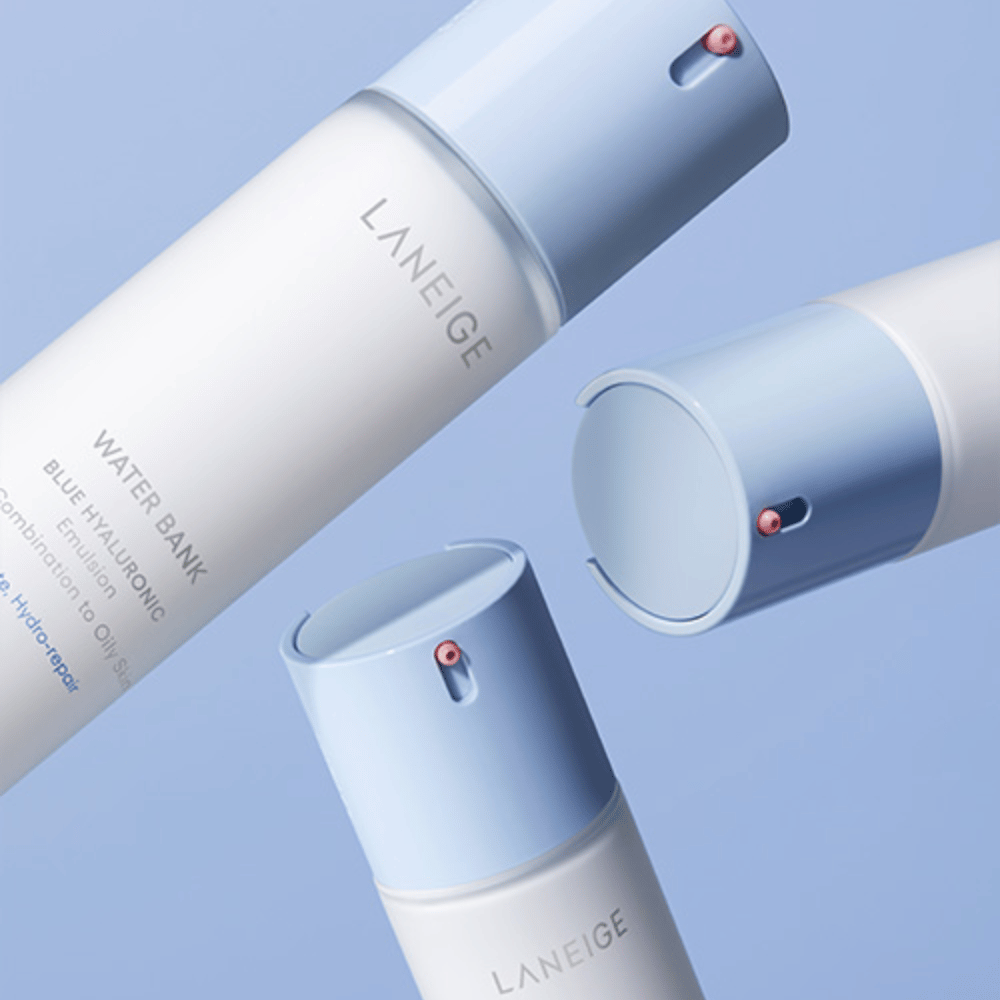 Three bottles of LANEIGE Water Bank Blue Hyaluronic Emulsion with light blue pump heads against a blue background, shown from different angles.